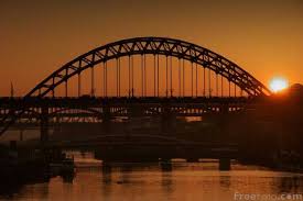 dark-bridge-and-orange-skies